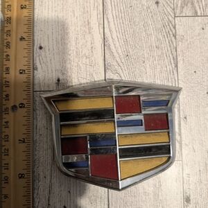 Cadillac Emblem with Red, Yellow, and Blue Accents
